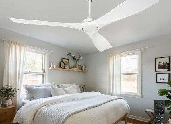 Ceiling fan installed in minimalist bedroom