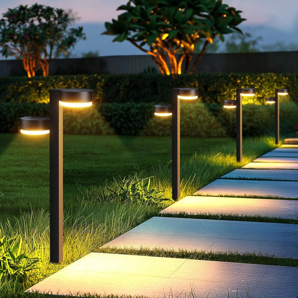 Pathway lit with low garden path lights at night