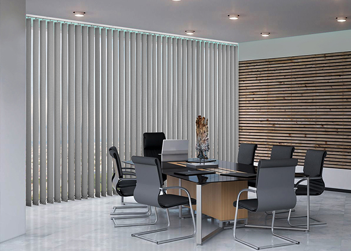 Vertical blinds installed in a corporate office by trusted office blinds curtains installer