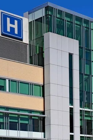 Professional office window tinting in hospitals to enhance patient privacy, block harmful UV rays, and create a cooler, more comfortable environment.